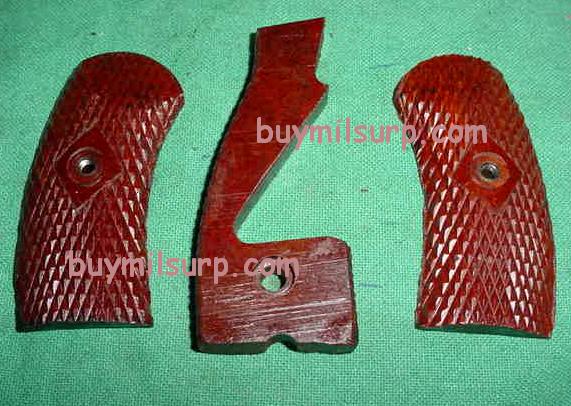 Grip Set (3 Pieces) M1895 Russian Nagant Revolver BAKELITE VG+ Grip Set (3 Pieces) M1895 Russian Nagant Revolver BAKELITE VG+